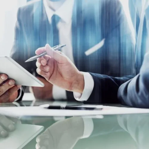 corporate-businessmen-working-tablet-office_53876-97637-1024x576.jpg